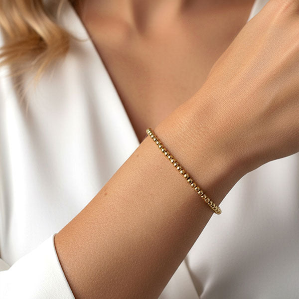 MUCHV 3mm ball bracelet in 18k gold (British brand)