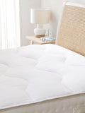 White mattress topper with dual layer design (British brand)