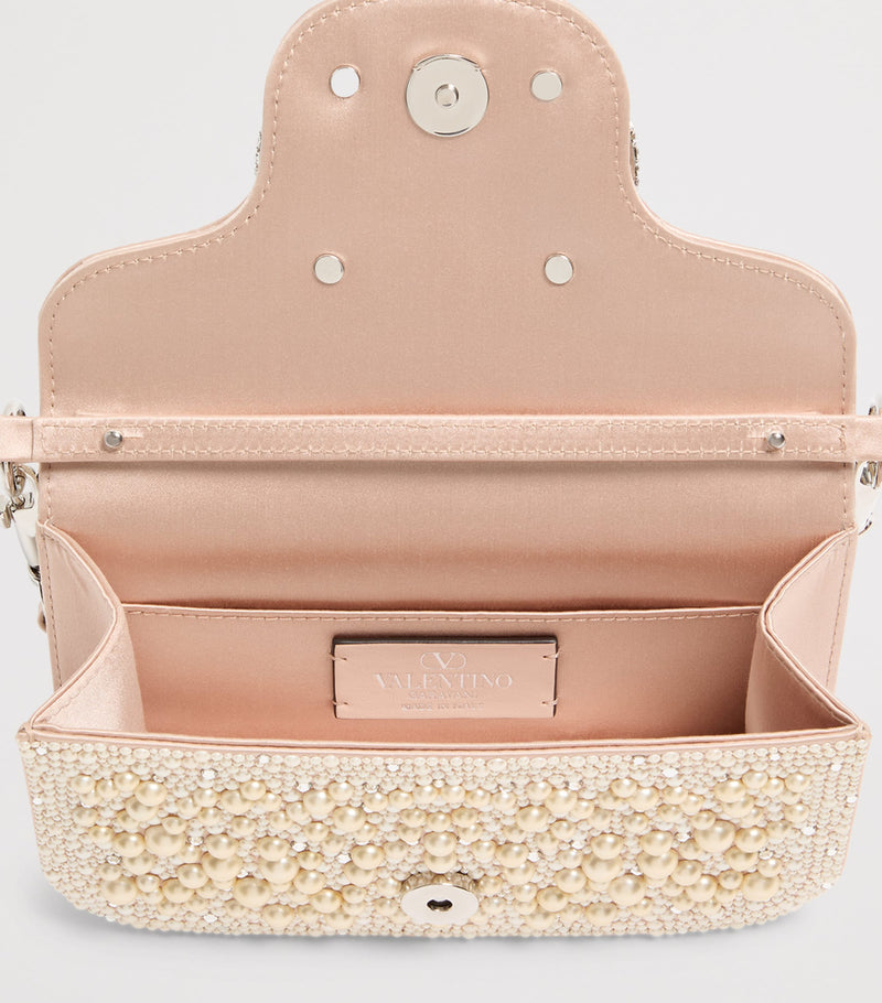 Valentino Garavani small embellished Locò shoulder bag, imported from the UK