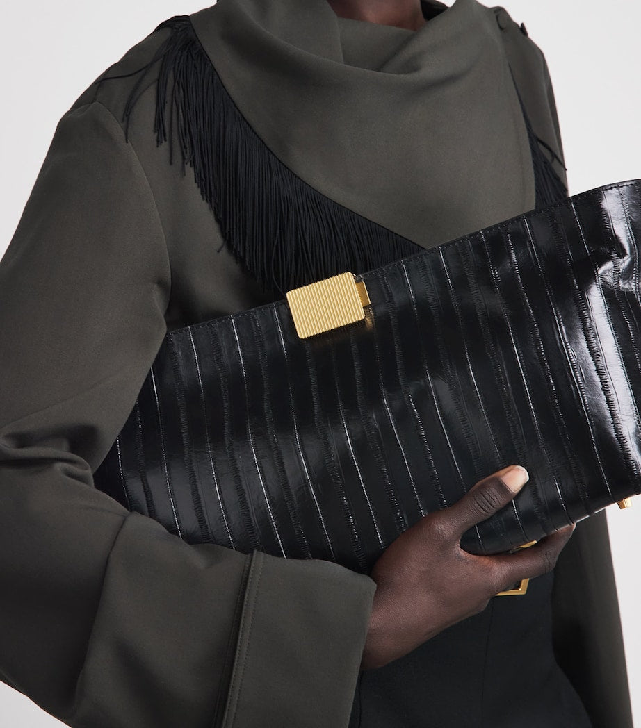 Camilla and Marc embossed leather poppy clutch bag (British brand)