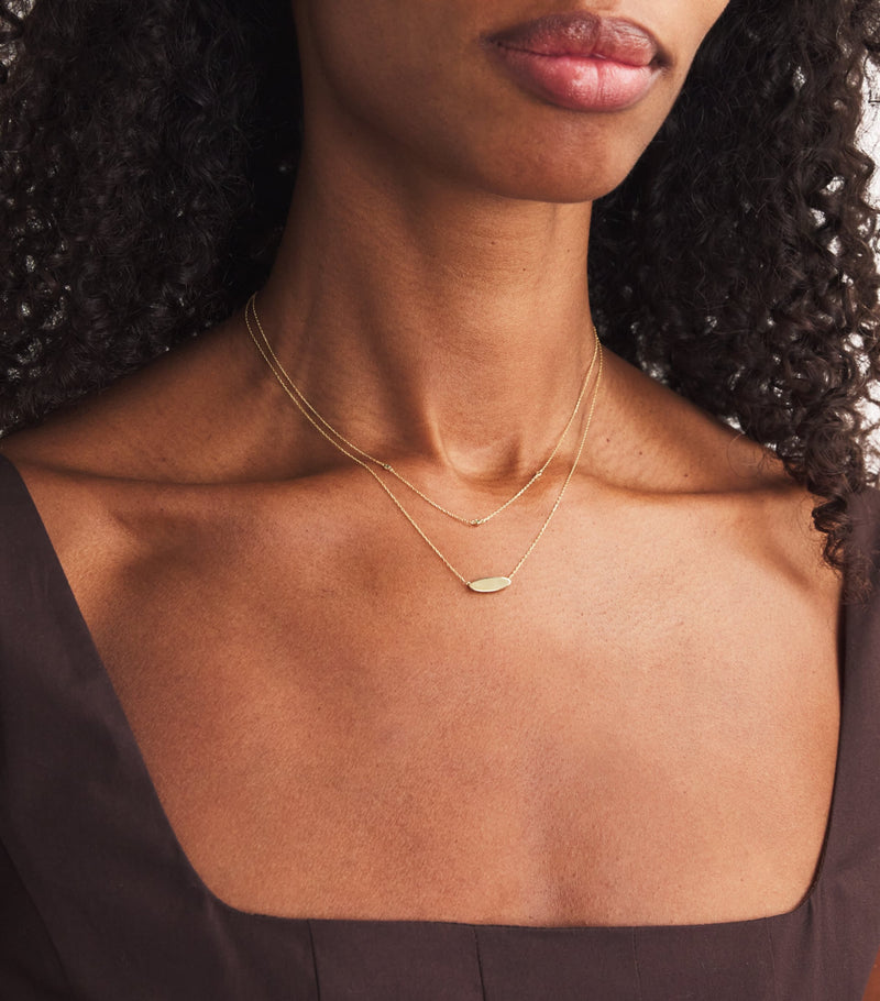 Astrid & Miyu yellow gold and emerald charm necklace - British product