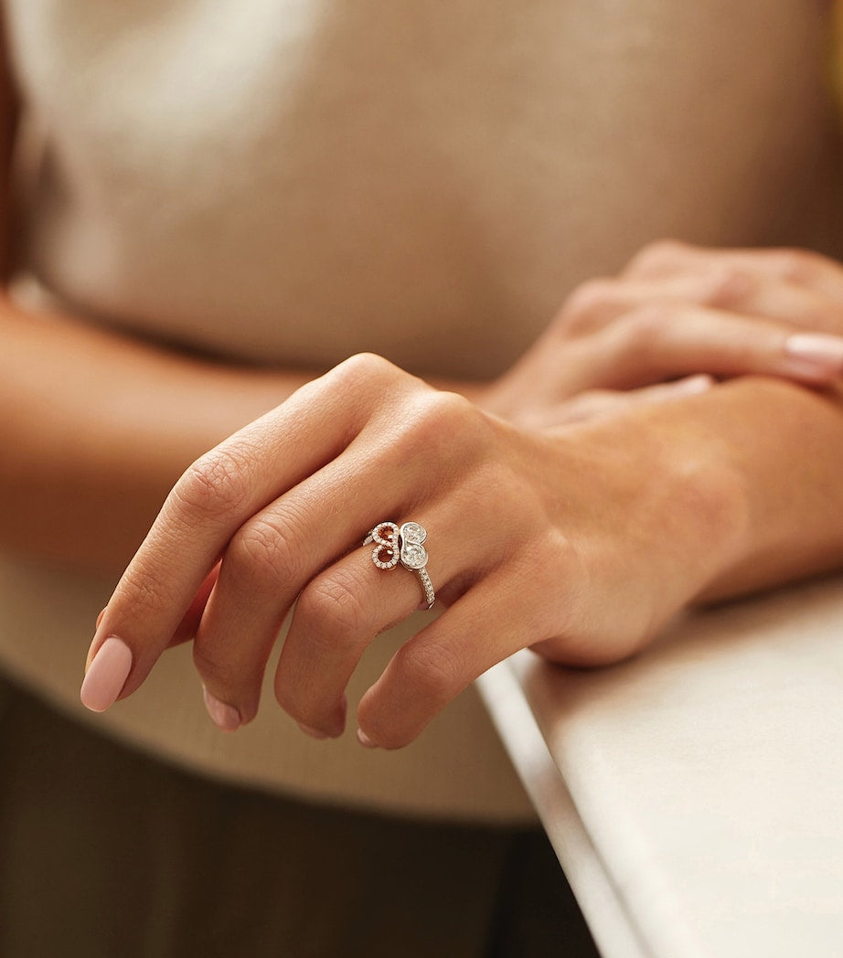 Boodles platinum rose gold diamond motif ring, imported from the UK