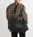Harrods Nylon-Reisetasche mit Lederbesatz und goldfarbenen Beschlägen, britische Version