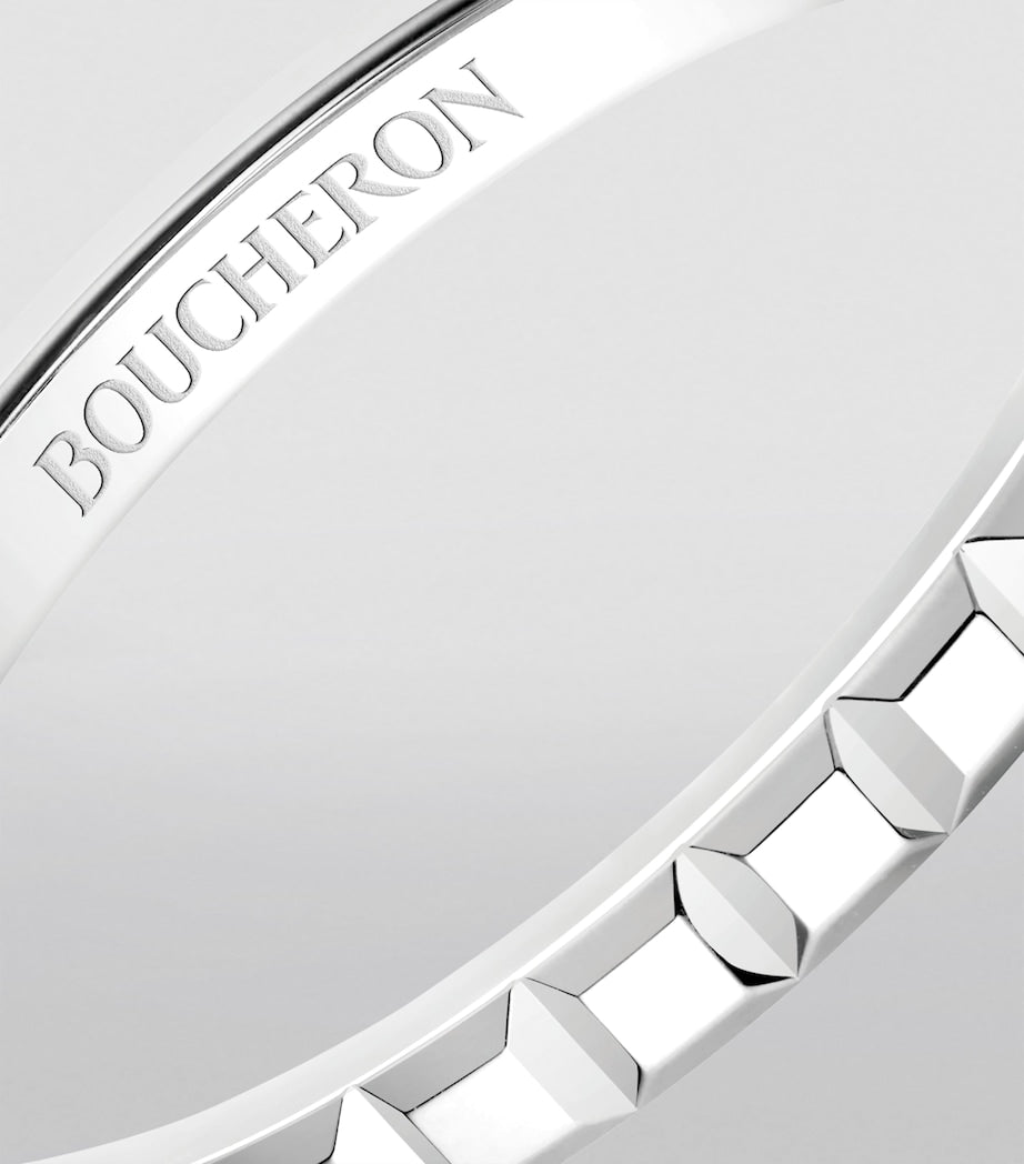 Boucheron mini platinum Clou de Paris wedding band (British brand)