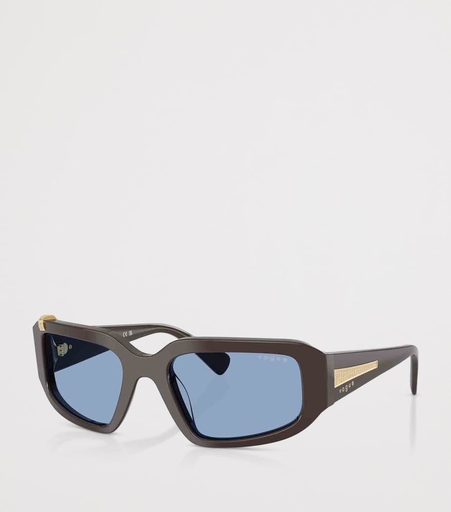 Vogue rhinestone irregular sunglasses with blue-tint lenses (British brand)