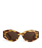 Alaïa Acetate Speckled Oval Sunglasses