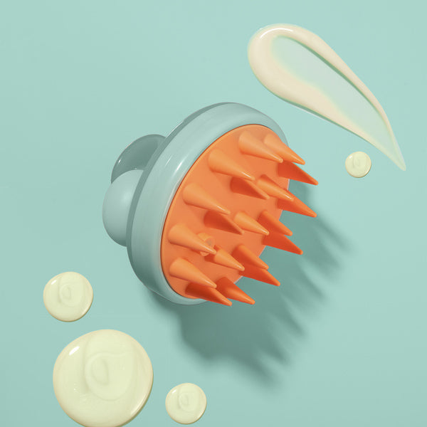 Nature Spell shampoo dispensing scalp massager, imported from the UK