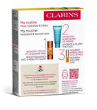 Clarins summer essentials skincare set with radiance drops and lip oil - British product