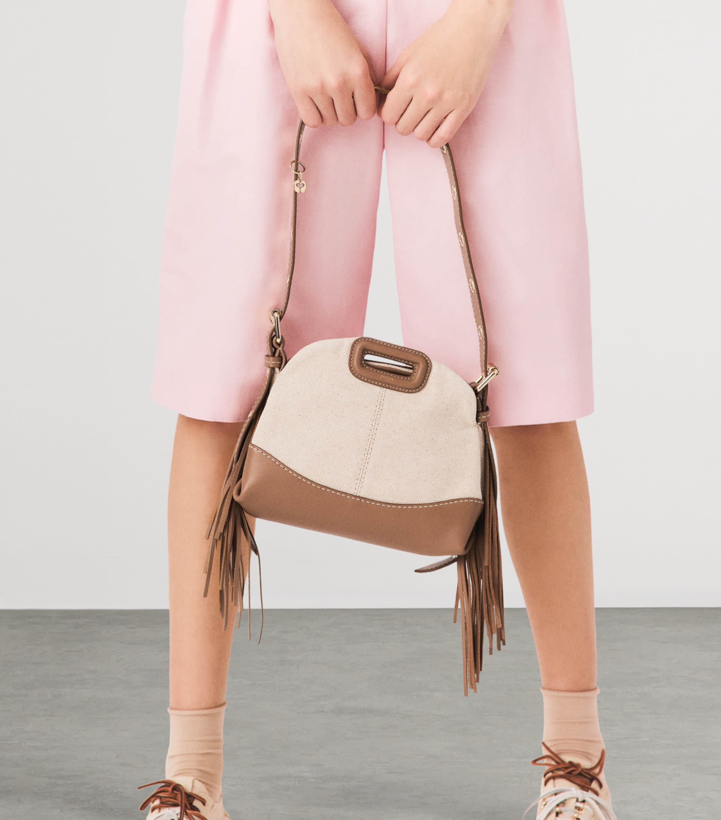 Maje small canvas Miss M shoulder bag, imported from the UK