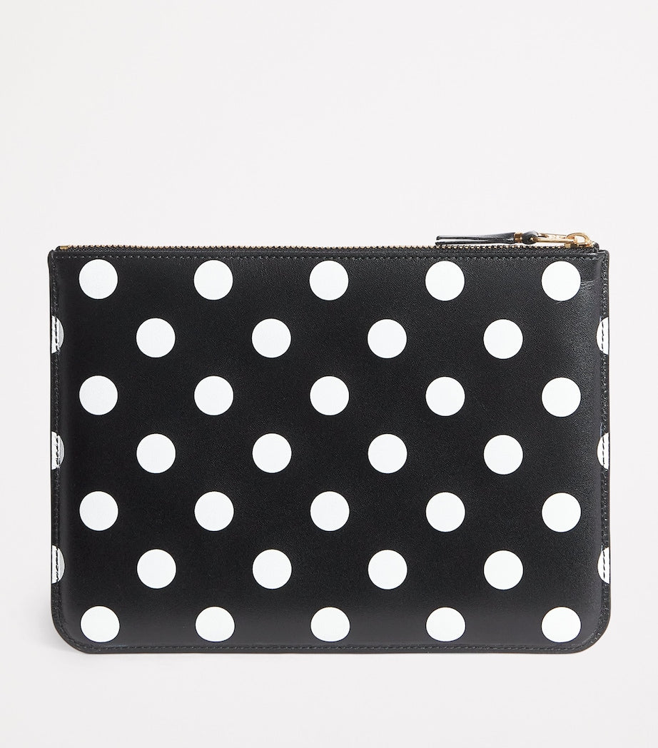 Comme Des Garçons large leather polka-dot zipped pouch, imported from the UK