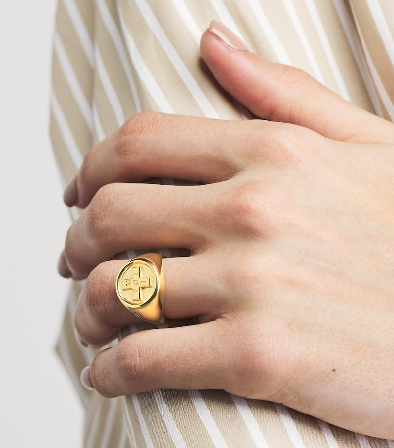 Tilly Sveaas gold-plated Moi + Toi signet ring (British brand)