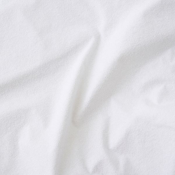 The Tiny Bed Co. mattress protector cot bed (British brand)