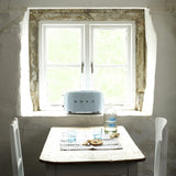 Pastel blue four slice toaster with wide slots, UK made (British brand)
