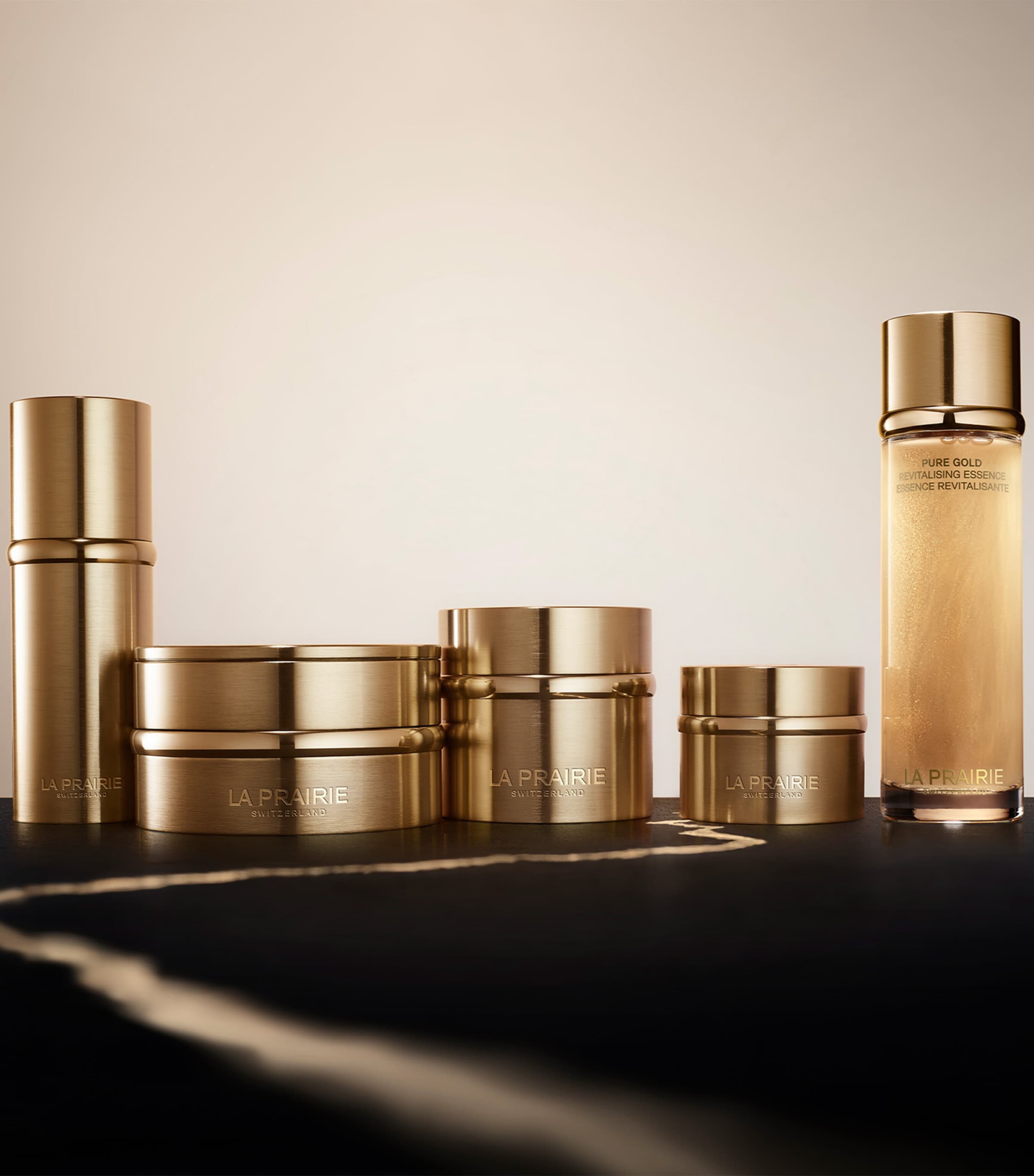 La Prairie Pure Gold Revitalising Essence 130ml, imported from the UK