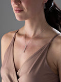 Infinity cubic zirconia pendant and earrings set in sterling silver (British brand)