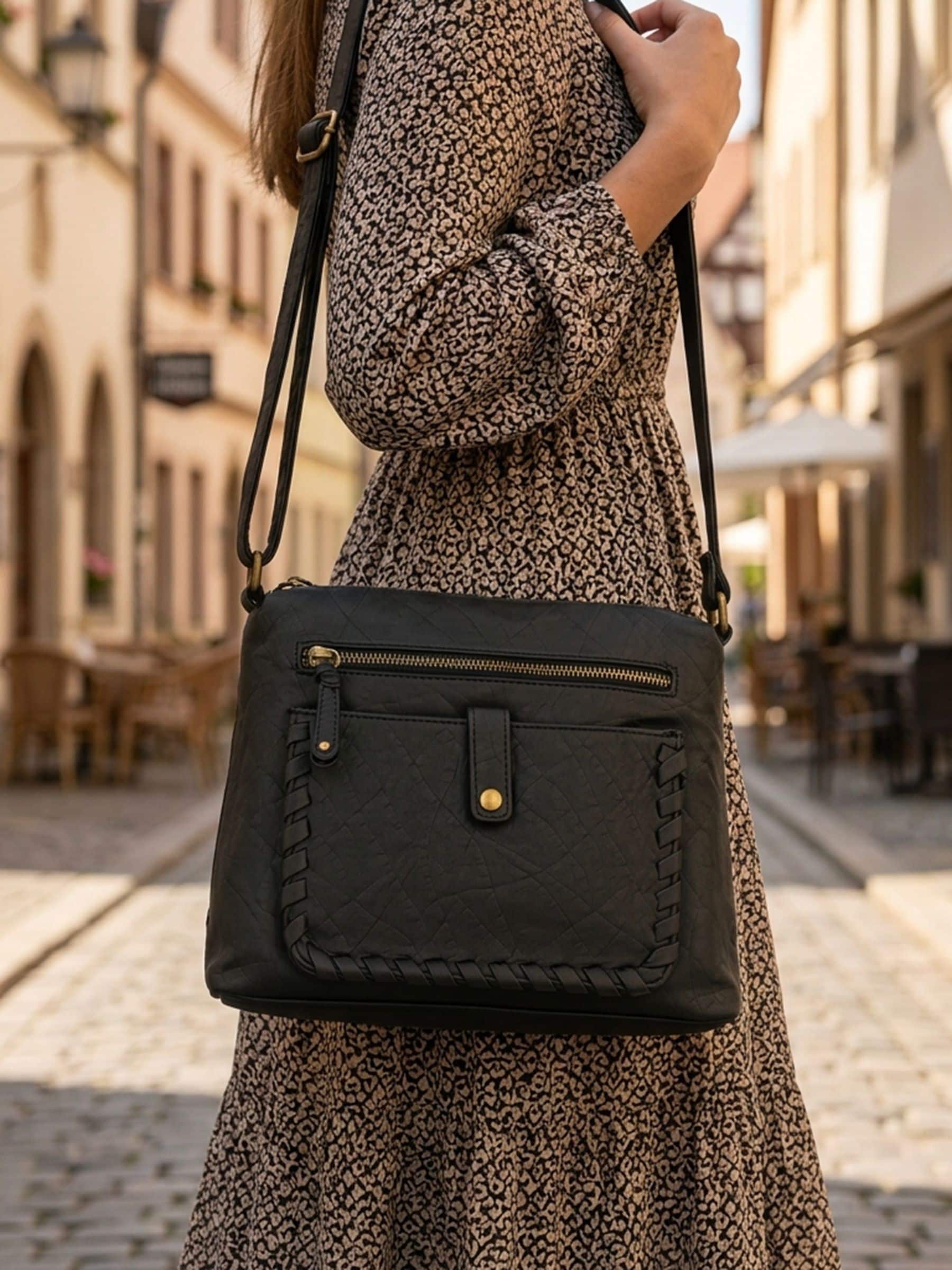 Pavers multi-pocket leather cross-body bag, imported from the UK
