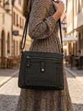 Pavers multi-pocket leather cross-body bag, imported from the UK