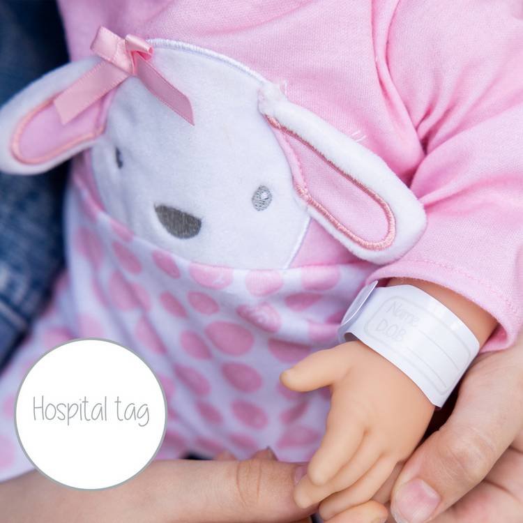 Tiny Treasures baby doll in pink bunny outfit imported from the UK