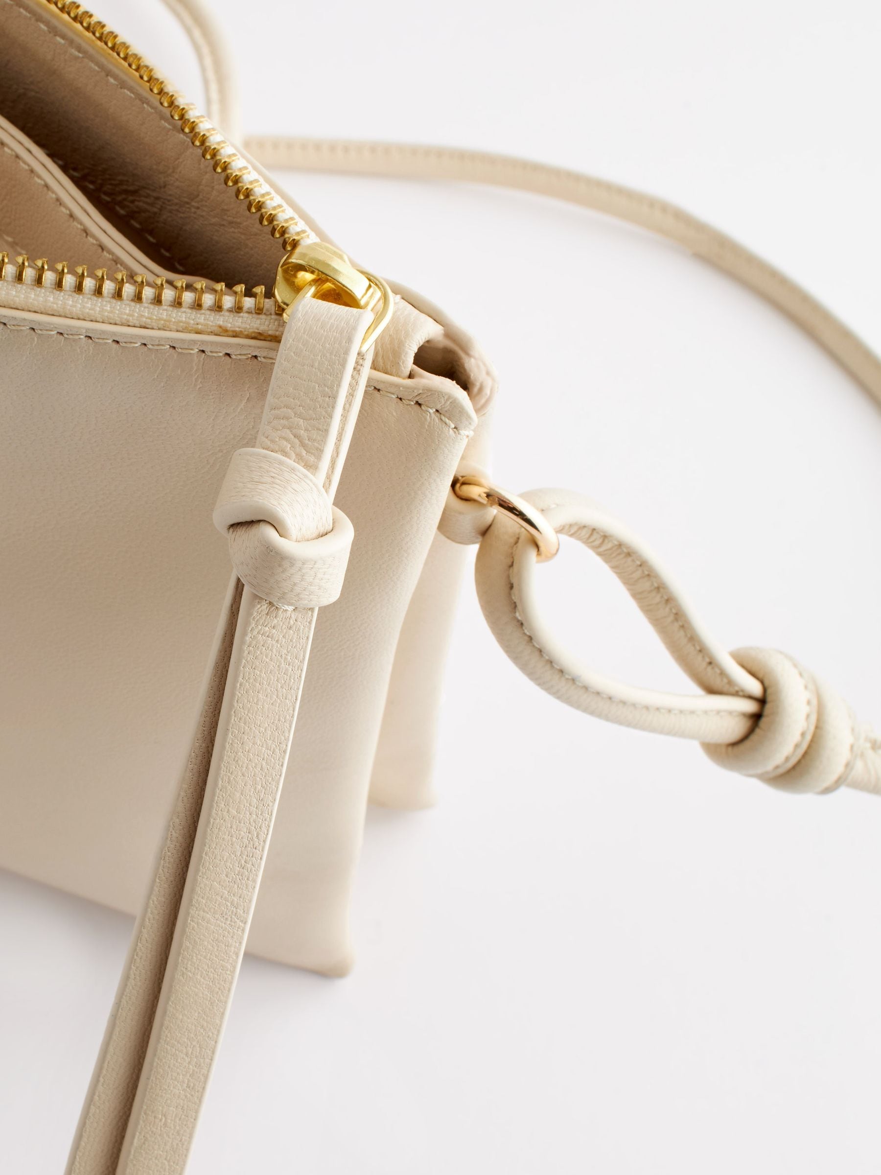 Small bone cream leather cross body bag - British product