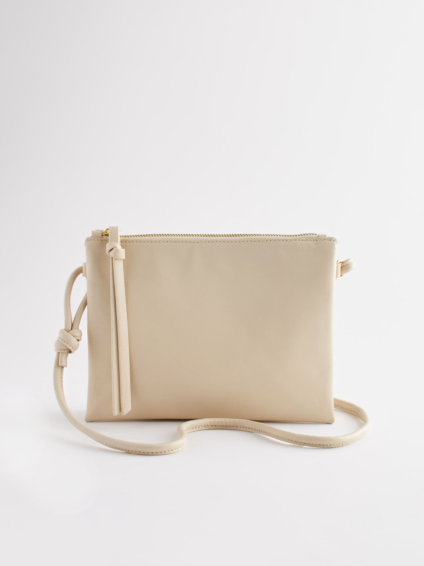 Small bone cream leather cross body bag - British product