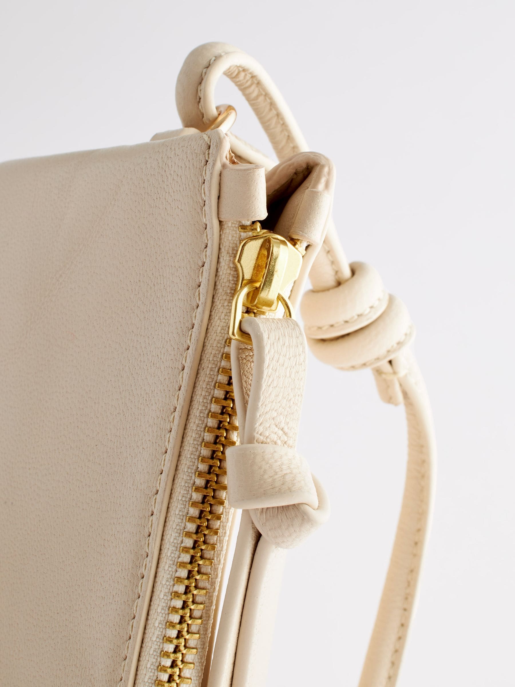 Small bone cream leather cross body bag - British product