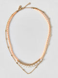 Oliver Bonas yellow cord faux pearl necklace (British brand)
