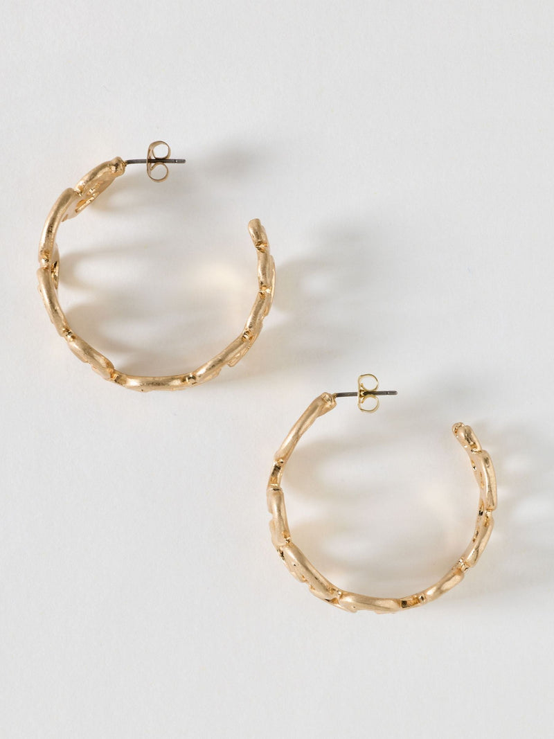 Oliver Bonas brushed metal hoop earrings, UK version