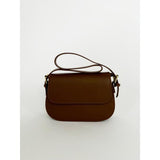 SVNX rounded crossbody bag in brown (British brand)