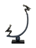 Libra Interiors antique gold bronze balancing act figures sculpture (British brand)