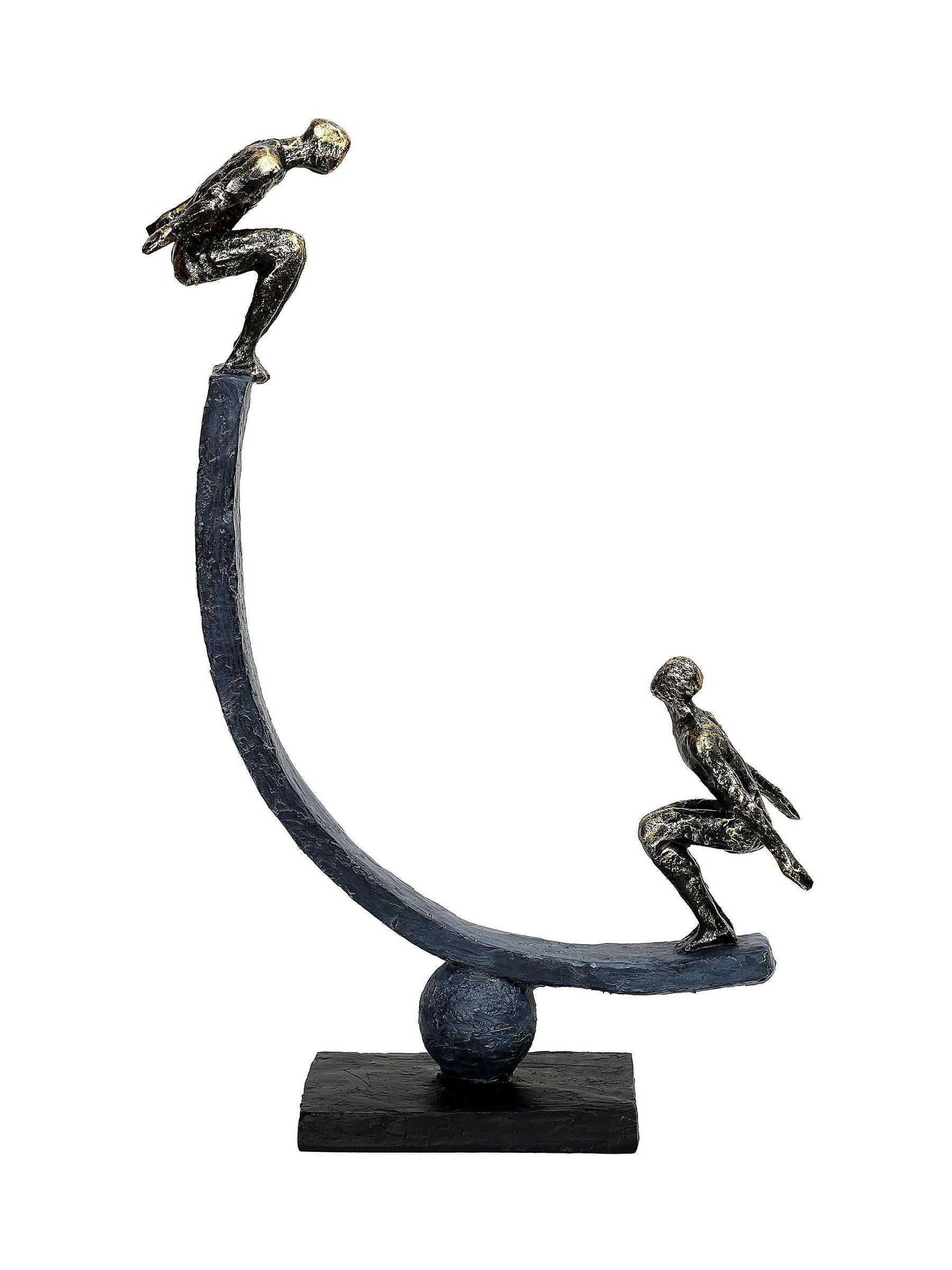 Libra Interiors antique gold bronze balancing act figures sculpture (British brand)