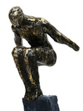Libra Interiors antique gold bronze balancing act figures sculpture (British brand)
