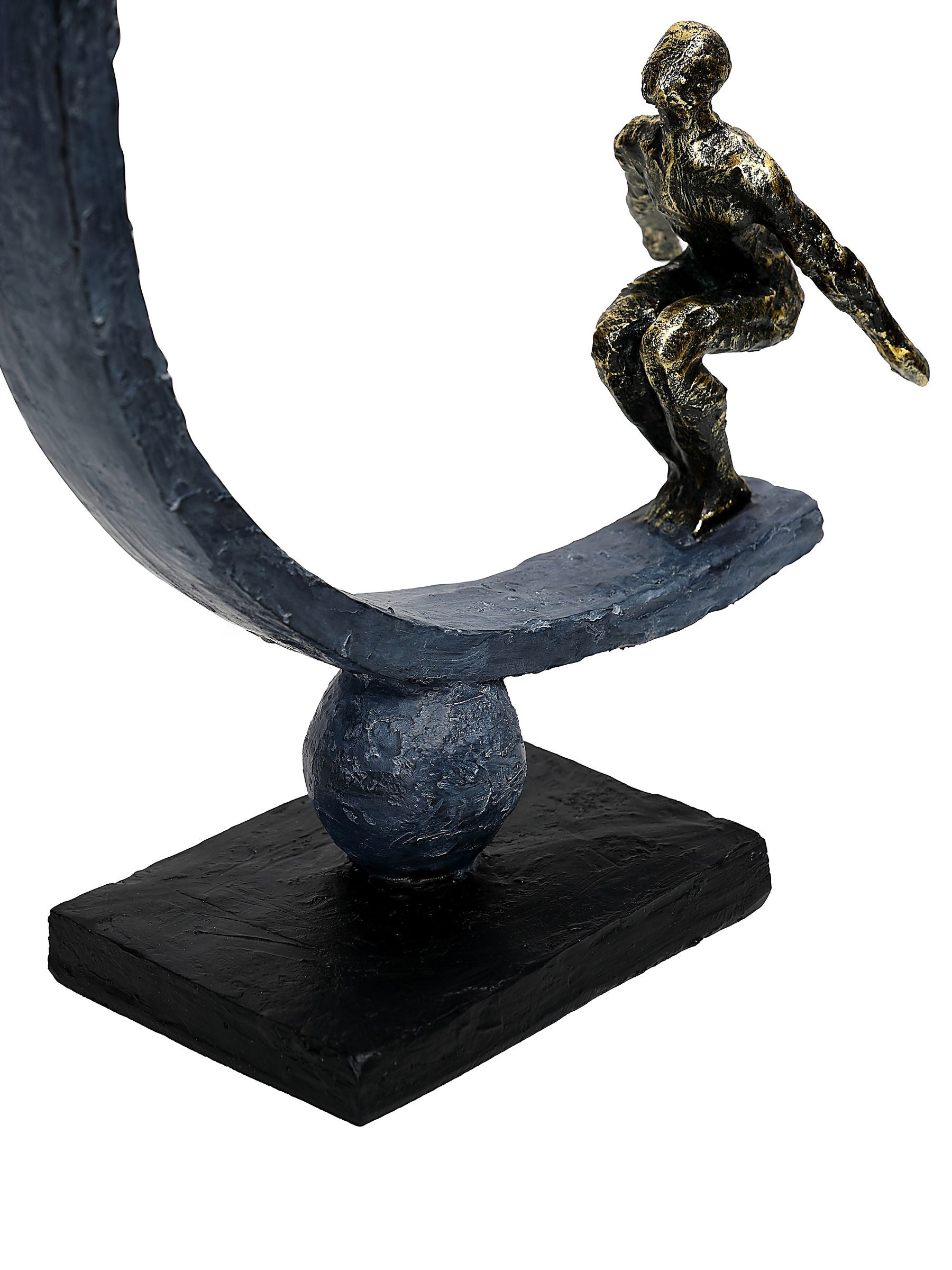 Libra Interiors antique gold bronze balancing act figures sculpture (British brand)