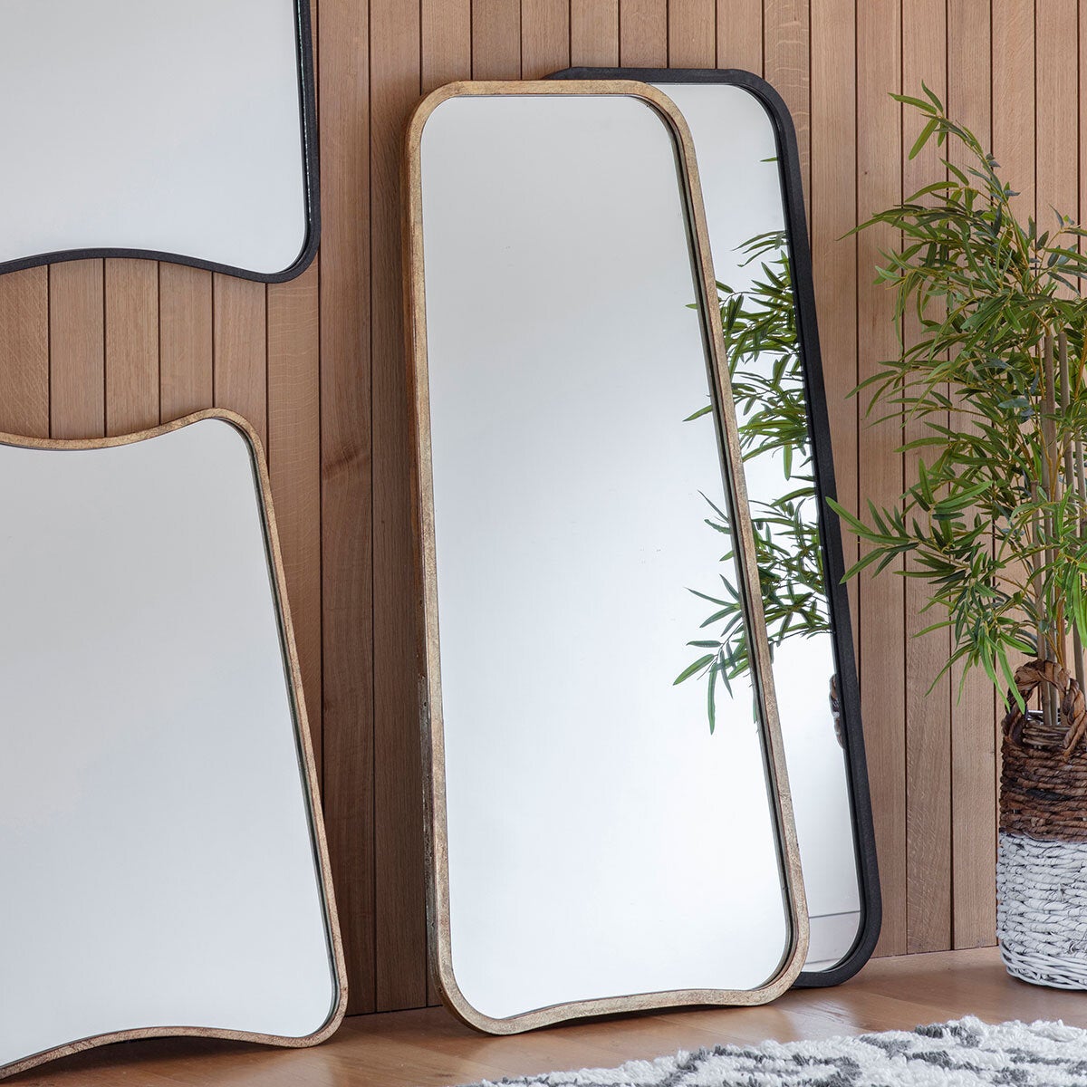 Gallery Kurva gold leaner mirror curved corners, imported from the UK