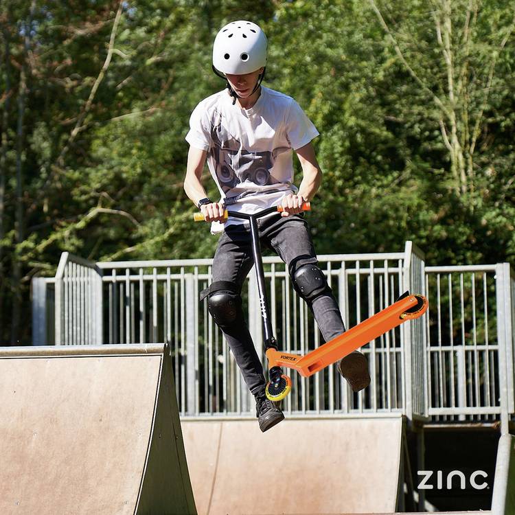 Zinc Vortex stunt scooter for kids in yellow and orange, imported from the UK