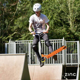 Zinc Vortex stunt scooter for kids in yellow and orange, imported from the UK