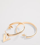 Valentino Garavani asymmetric hoop earring with crystal V pendant (British brand)