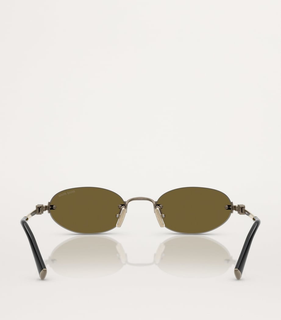 Miu Miu oval metal sunglasses, imported from the UK