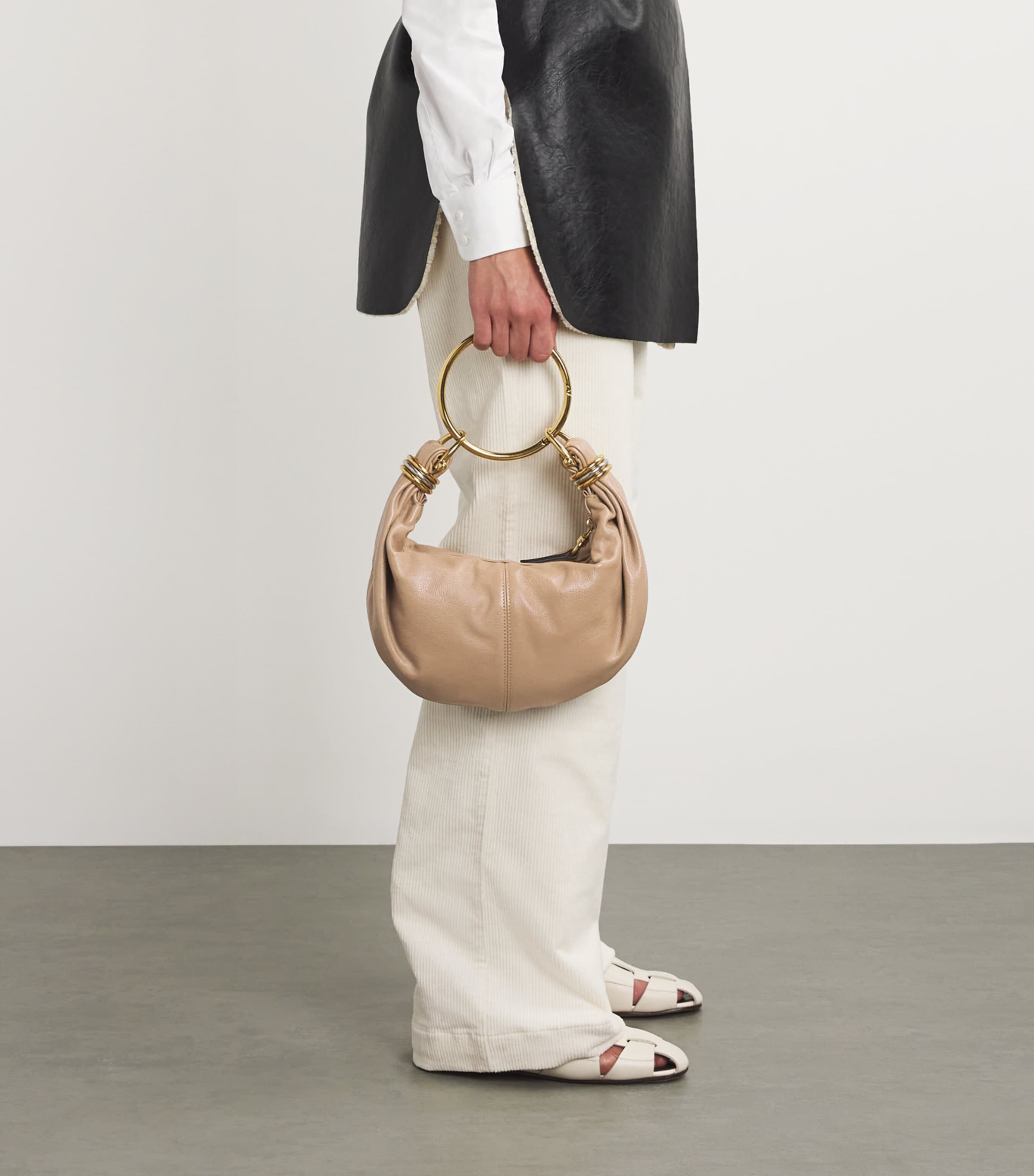Chloé small leather bracelet bag with gold-tone handle (British brand)