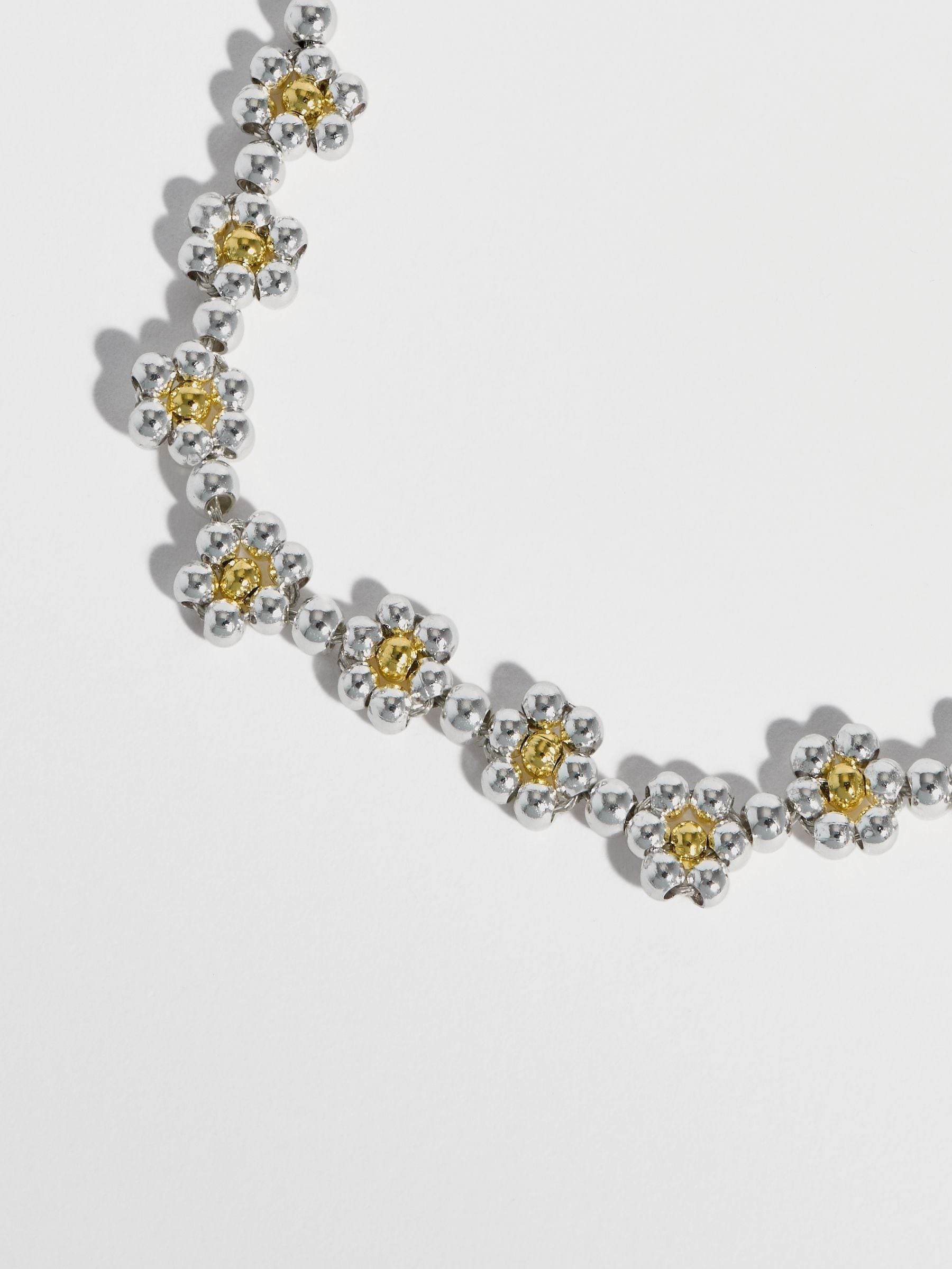 Estella Bartlett silver floral daisy chain bracelet, imported from the UK