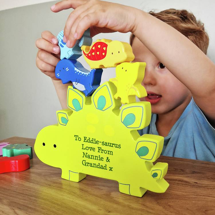 Personalised wooden dinosaur stacker toy, imported from the UK