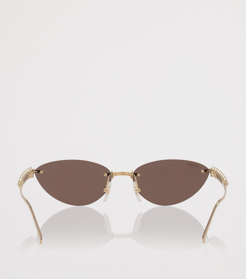 Cartier cat-eye sunglasses with gold-tone metal frames - British product