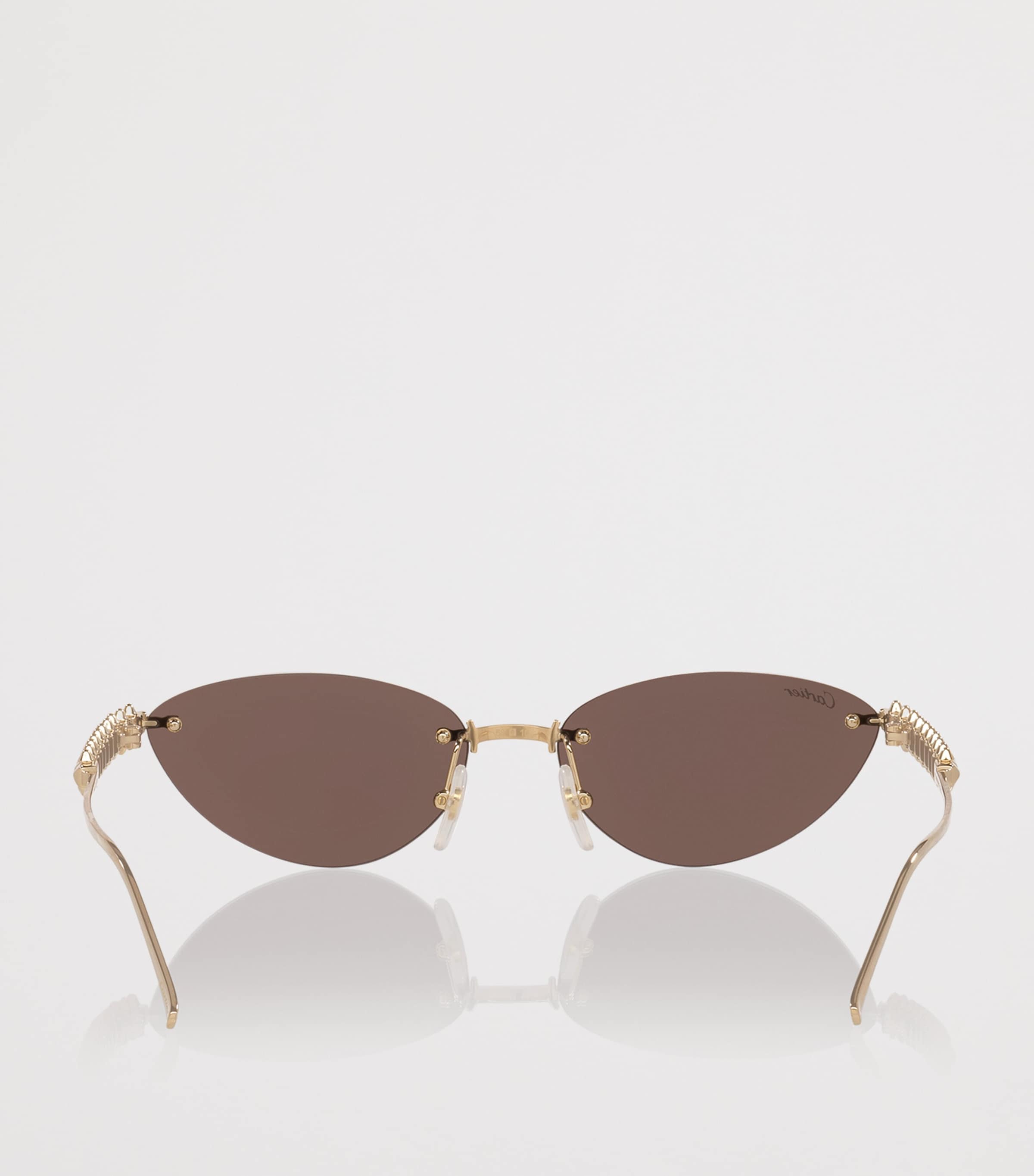 Cartier cat-eye sunglasses with gold-tone metal frames - British product