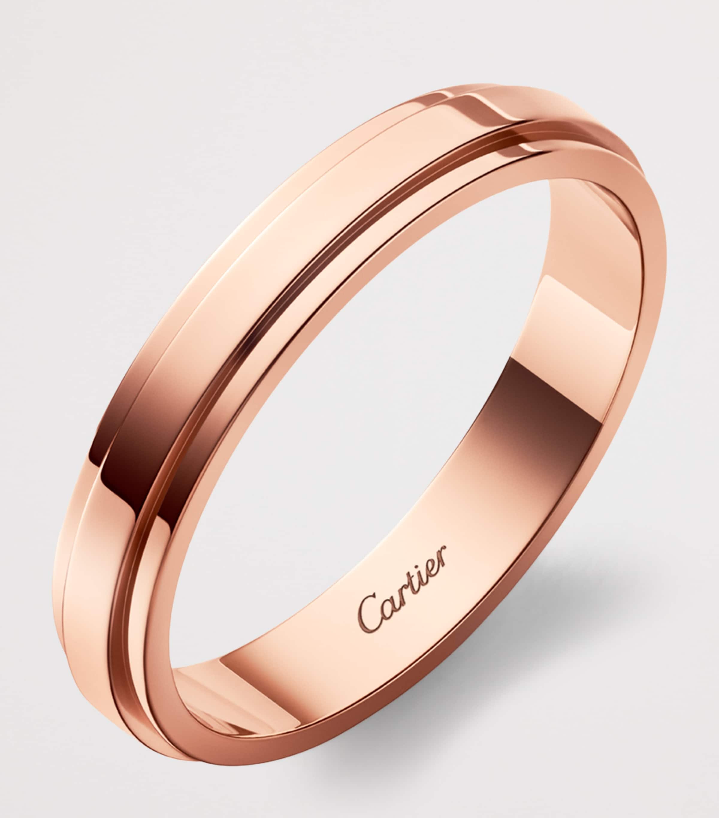 Cartier d'Amour rose gold wedding ring, imported from the UK
