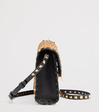 Valentino Garavani small leather rockstud shoulder bag (British brand)