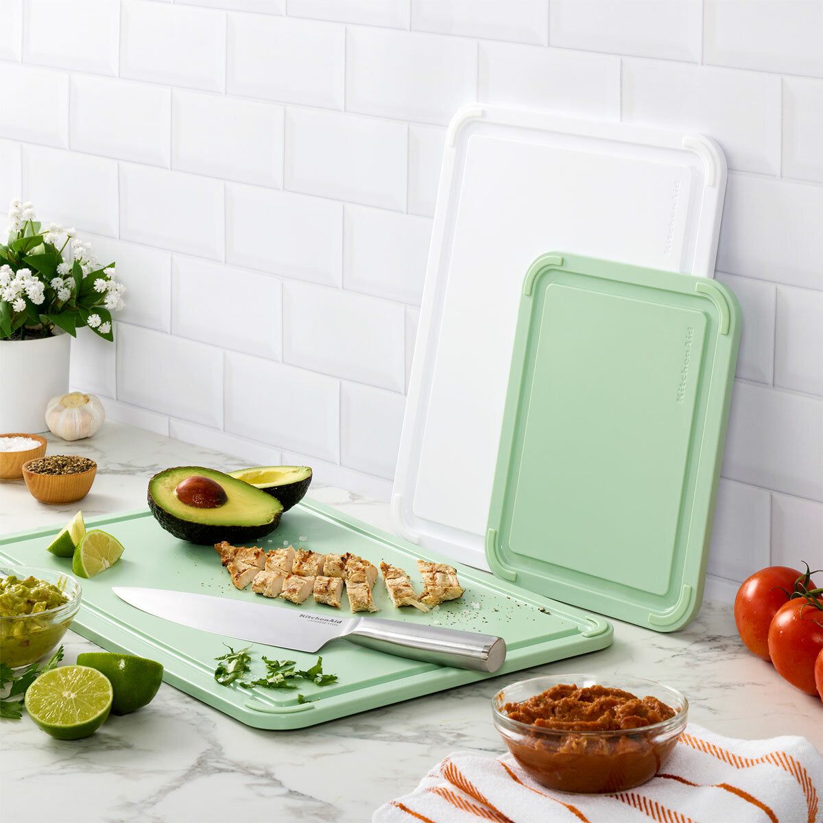 KitchenAid 3-piece cutting board set in green, imported from the UK