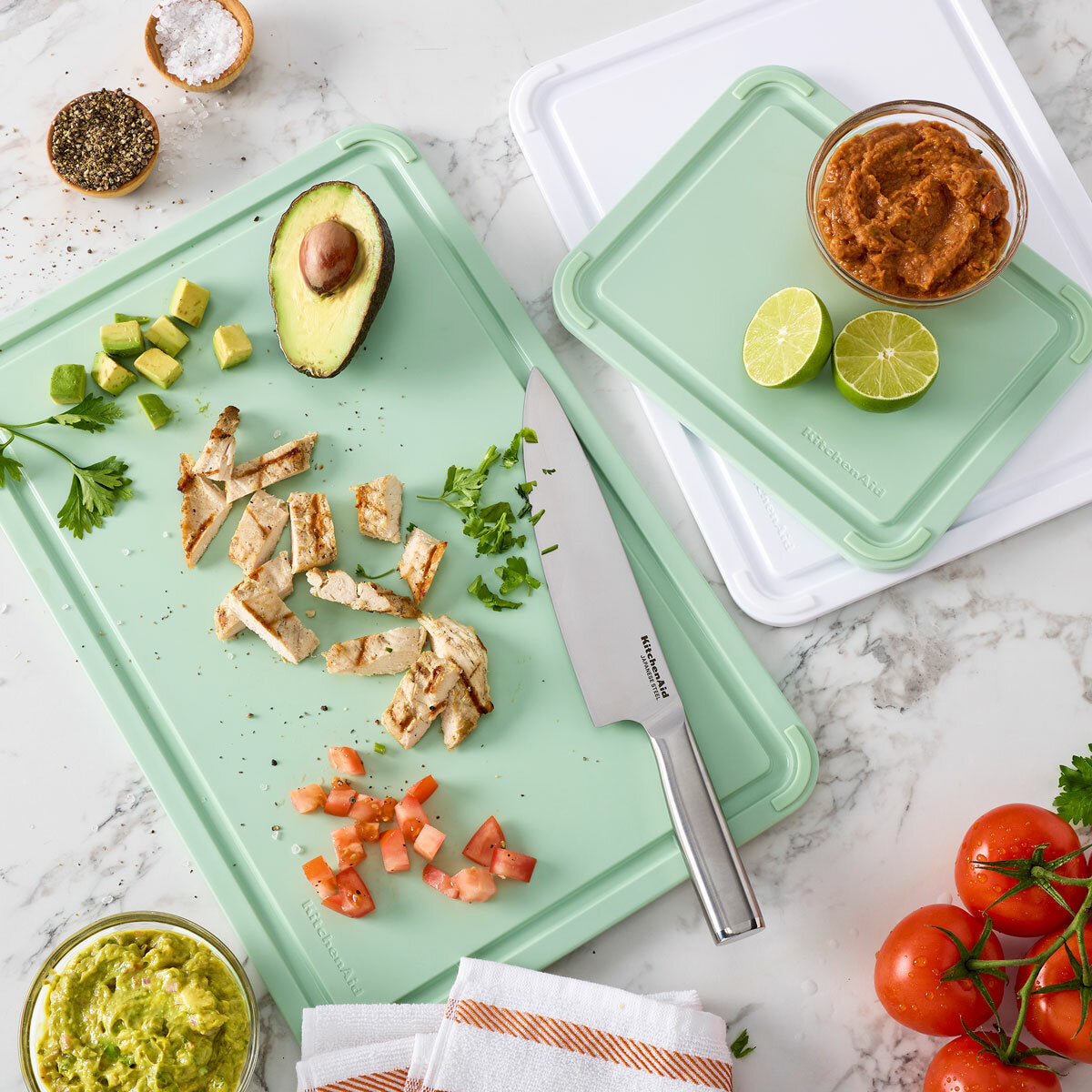 KitchenAid 3-piece cutting board set in green, imported from the UK