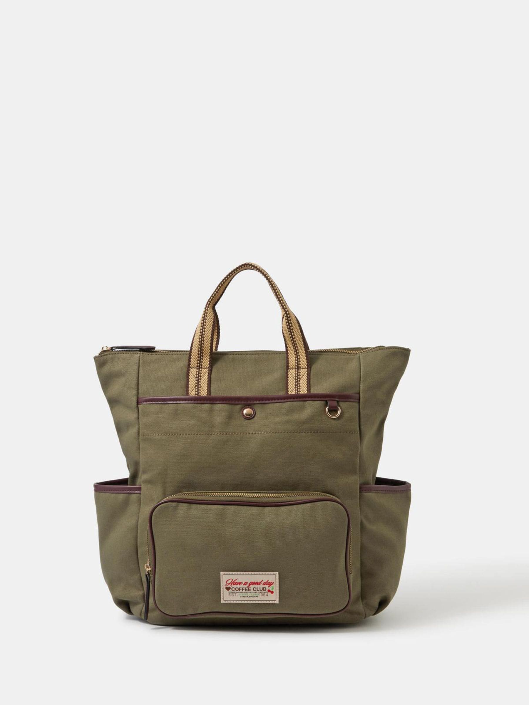 Accessorize green canvas multi-pocket backpack, imported from the UK