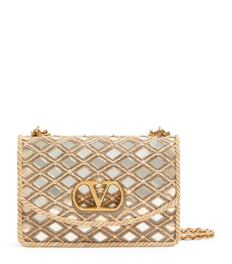 Valentino Garavani Vain shoulder bag with rhinestone embellishments (British brand)