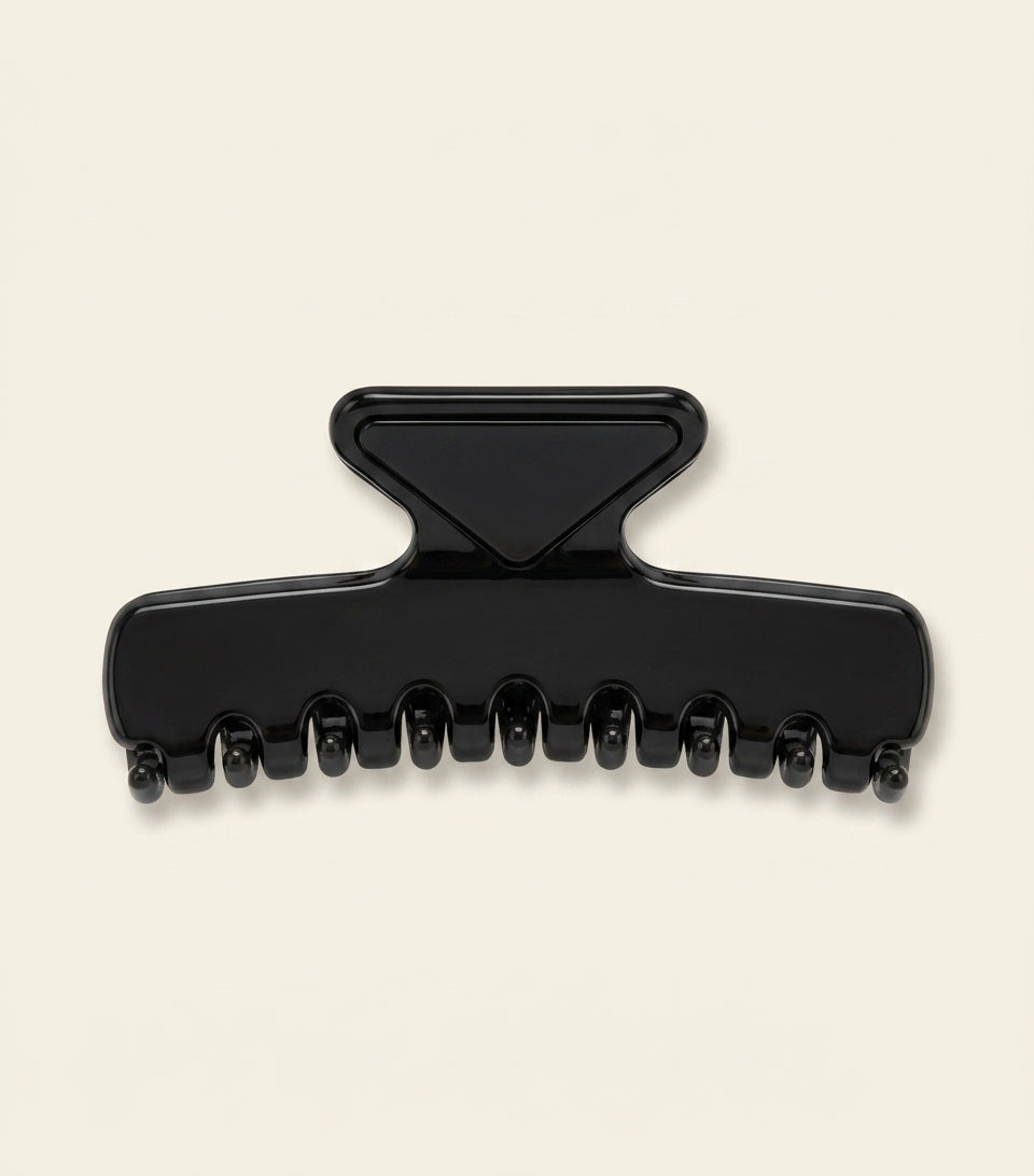 Prada triangle logo claw clip hair accessory, imported from the UK