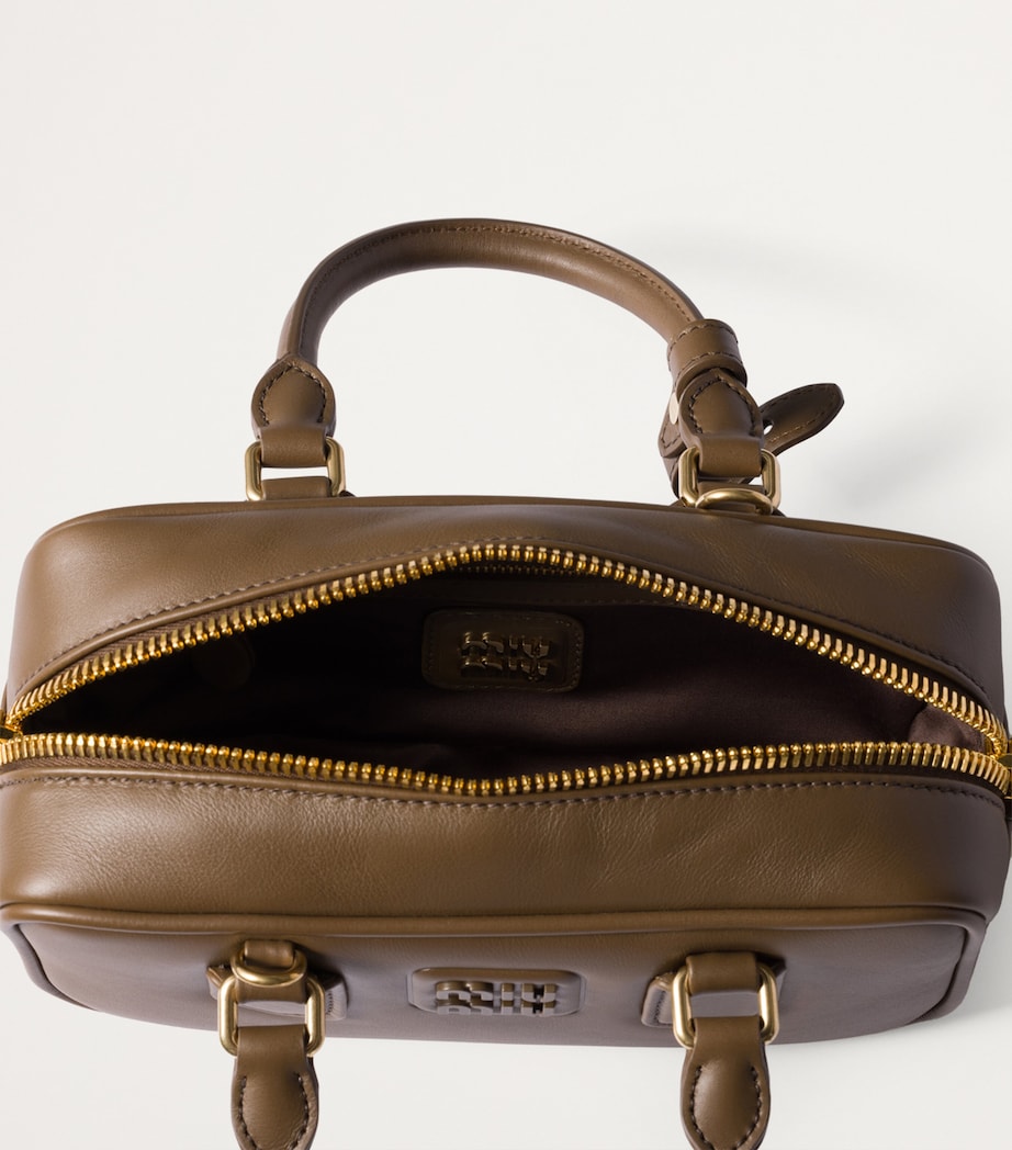 Miu Miu Arcadie top-handle bag, imported from the UK